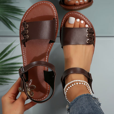 Dunkelbraune Flache Sandalen mit Knöchelriemen - Nora