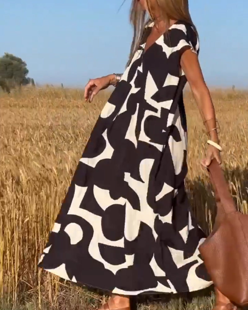 Elowen - Unregelmäßiges geometrisches Druck ärmelloses Kleid